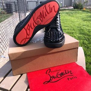 Christian louboutins ( Red bottoms ) .